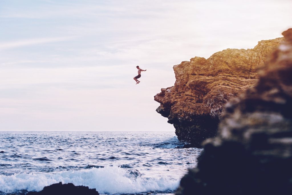 taking risks, cliff diving